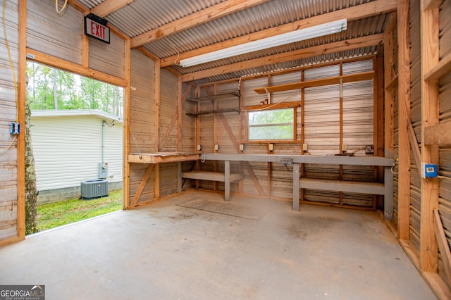 1530 Mcbrayer, Temple, GA 30179 - garage with a workshop area and central air condition unit