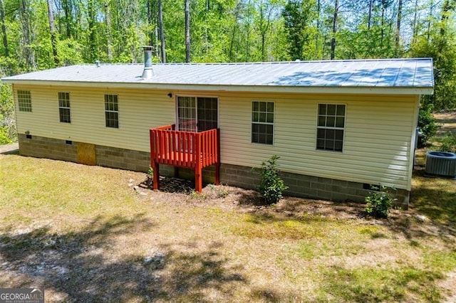 1530 Mcbrayer, Temple, GA 30179 - rear view of property featuring crawl space, central AC unit, metal roof, and a wooden deck