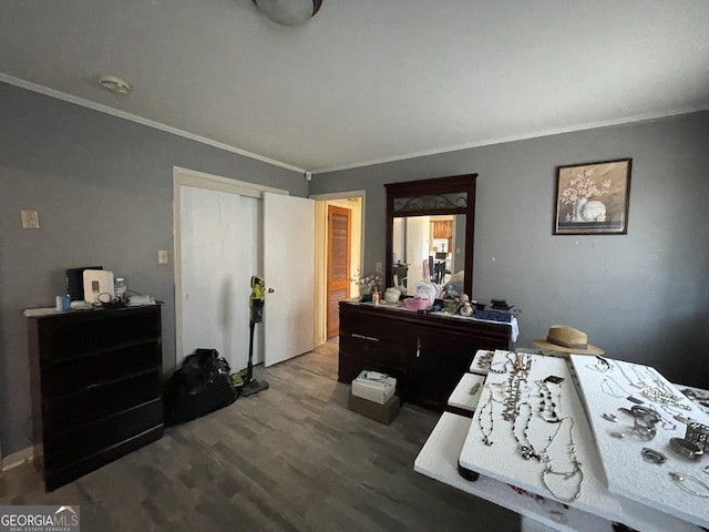 1105 College St, Bainbridge, GA 39819 - bedroom with ornamental molding, wood finished floors, and a closet