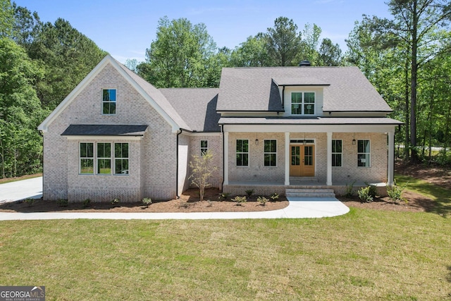 2000 Millstream Ct, Griffin, GA 30224 - modern farmhouse style home featuring a porch, a front yard, a shingled roof, and french doors