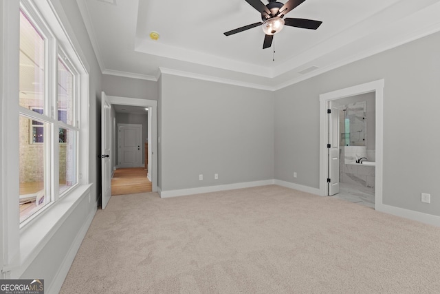2000 Millstream Ct, Griffin, GA 30224 - unfurnished bedroom with baseboards, light carpet, crown molding, and a raised ceiling