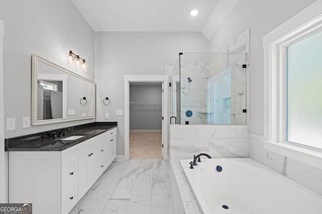 2000 Millstream Ct, Griffin, GA 30224 - full bath featuring a spacious closet, marble finish floor, vanity, a garden tub, and a stall shower
