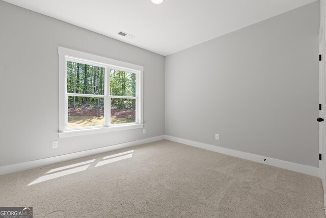 2000 Millstream Ct, Griffin, GA 30224 - unfurnished room with carpet floors, visible vents, and baseboards
