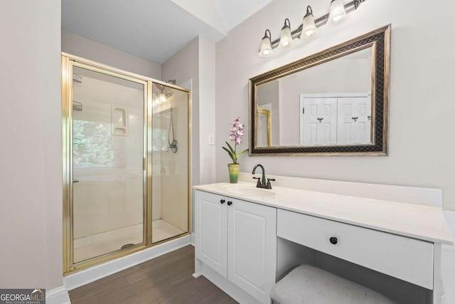 2745 Princeton Trce, Cumming, GA 30041 - bathroom featuring vanity, wood finished floors, and a stall shower