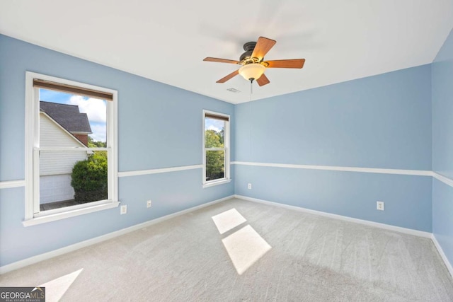 2745 Princeton Trce, Cumming, GA 30041 - spare room with visible vents, baseboards, a ceiling fan, and carpet flooring