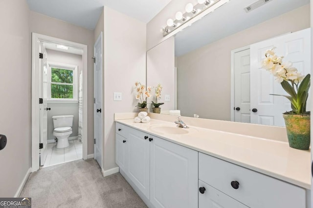 2745 Princeton Trce, Cumming, GA 30041 - bathroom featuring baseboards, toilet, vanity, and visible vents