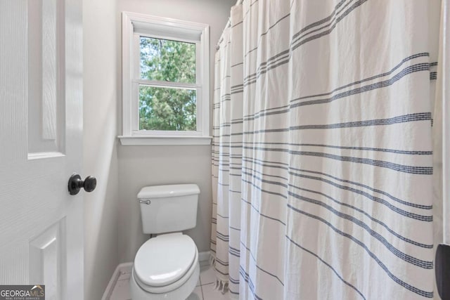 2745 Princeton Trce, Cumming, GA 30041 - full bathroom featuring toilet, a shower with shower curtain, and baseboards