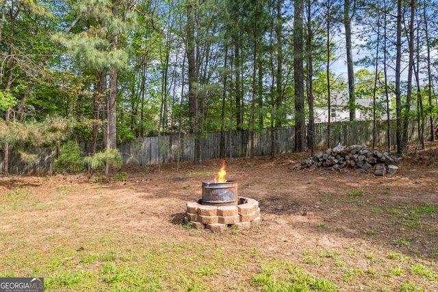 2745 Princeton Trce, Cumming, GA 30041 - view of yard featuring fence and an outdoor fire pit