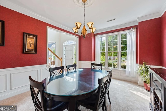 2745 Princeton Trce, Cumming, GA 30041 - dining area with wainscoting, light carpet, a chandelier, and visible vents