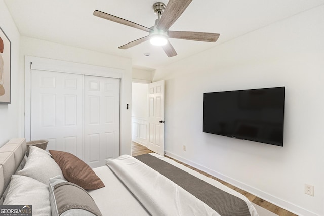 1258 Lyle Ave, East Point, GA 30344 - bedroom with a closet, a ceiling fan, baseboards, and wood finished floors