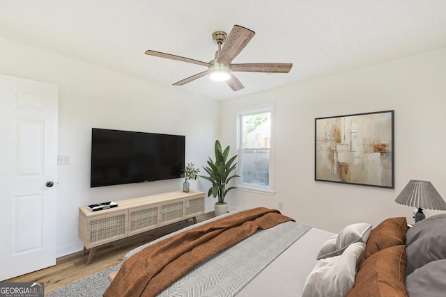 1258 Lyle Ave, East Point, GA 30344 - bedroom featuring baseboards, ceiling fan, and wood finished floors