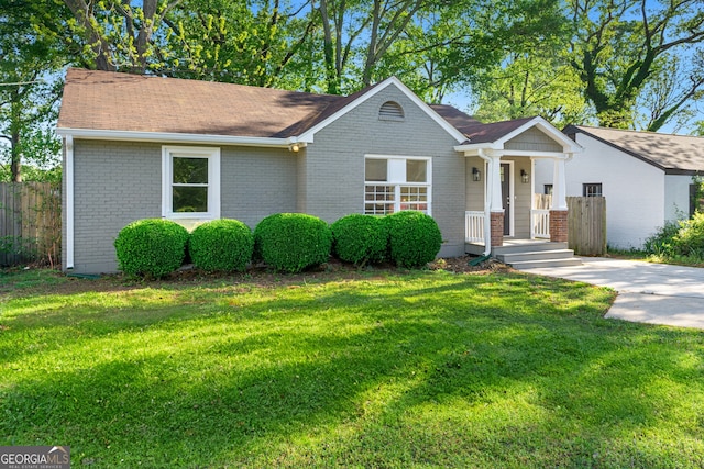 1258 Lyle Ave, East Point, GA 30344 - single story home with brick siding, a front lawn, and fence
