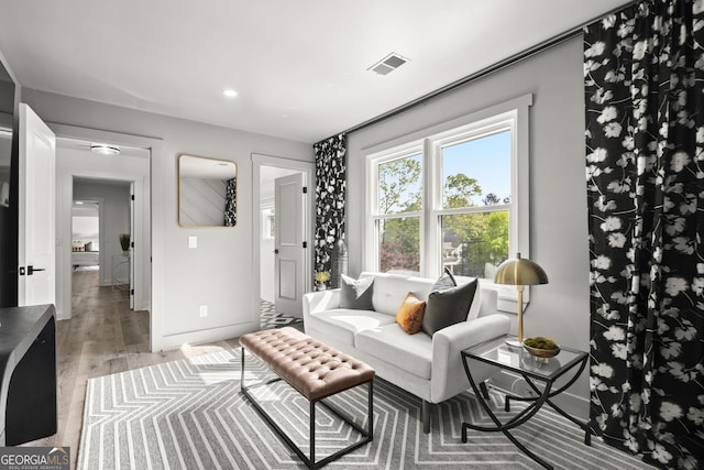 4440 Webb Bridge Rd, Alpharetta, GA 30005 - living room with light wood-style floors, baseboards, and recessed lighting