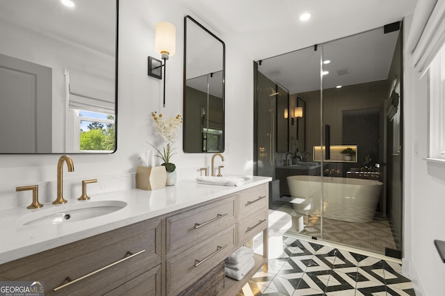 4440 Webb Bridge Rd, Alpharetta, GA 30005 - bathroom featuring double vanity, a freestanding tub, recessed lighting, inlaid floor details, and a shower stall