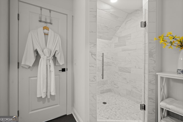 4440 Webb Bridge Rd, Alpharetta, GA 30005 - bathroom with a shower stall and baseboards