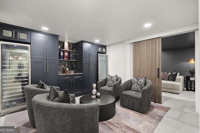 4440 Webb Bridge Rd, Alpharetta, GA 30005 - living room with wine cooler, a bar, and recessed lighting