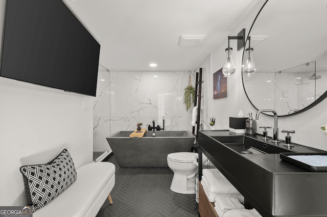 4440 Webb Bridge Rd, Alpharetta, GA 30005 - full bath with toilet, a soaking tub, vanity, a marble finish shower, and recessed lighting
