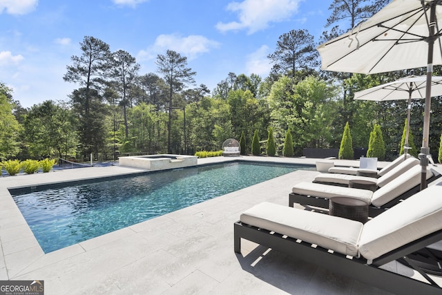 4440 Webb Bridge Rd, Alpharetta, GA 30005 - view of swimming pool with a patio and a pool with connected hot tub