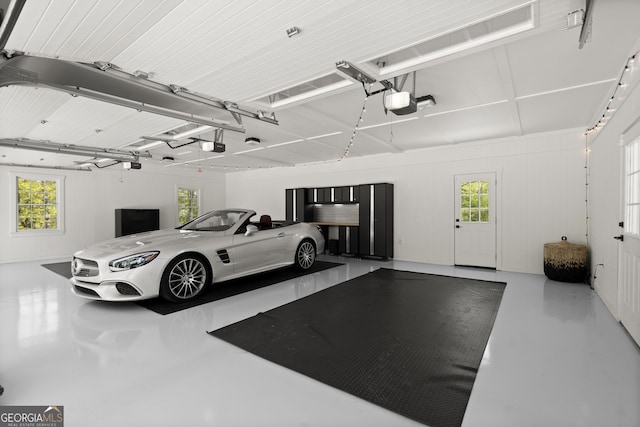 4440 Webb Bridge Rd, Alpharetta, GA 30005 - garage with a garage door opener