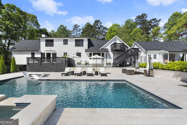 4440 Webb Bridge Rd, Alpharetta, GA 30005 - view of pool featuring outdoor lounge area, stairway, a patio area, a pool with connected hot tub, and a wooden deck
