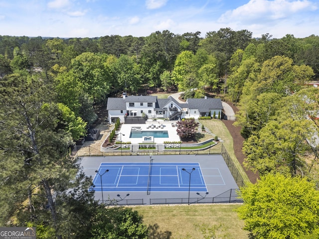 4440 Webb Bridge Rd, Alpharetta, GA 30005 - view of subject property featuring a forest and a pool area