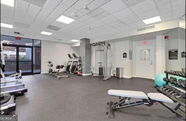 375 Ralph Mcgill Blvd # 1503, Atlanta, GA 30312 - gym featuring a drop ceiling and baseboards