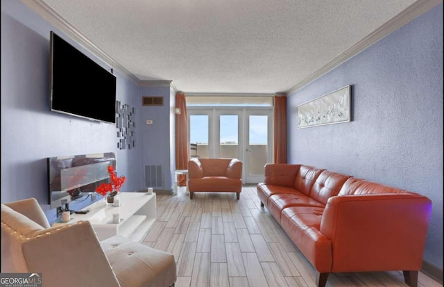 375 Ralph Mcgill Blvd # 1503, Atlanta, GA 30312 - living room with ornamental molding, a textured ceiling, a textured wall, and light wood finished floors