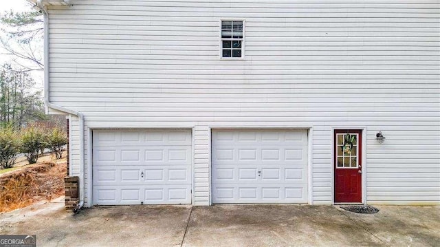 garage with driveway