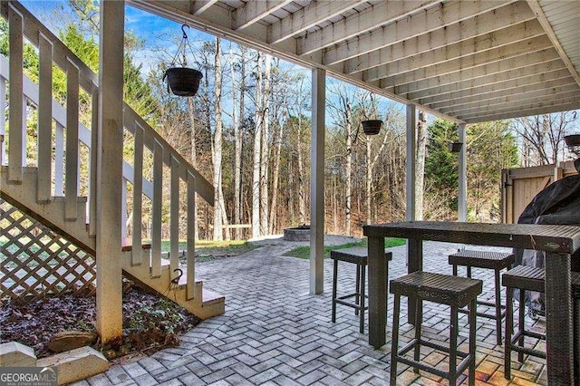 view of patio featuring stairs