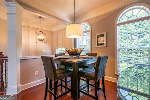 2145 Shoop Ct SE Unit 3, Smyrna, GA 30080 - dining space with dark wood-type flooring, plenty of natural light, ornamental molding, a chandelier, and decorative columns
