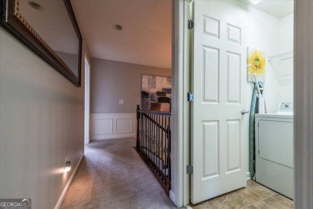 2145 Shoop Ct SE Unit 3, Smyrna, GA 30080 - hallway with washer / clothes dryer, wainscoting, a decorative wall, an upstairs landing, and light colored carpet