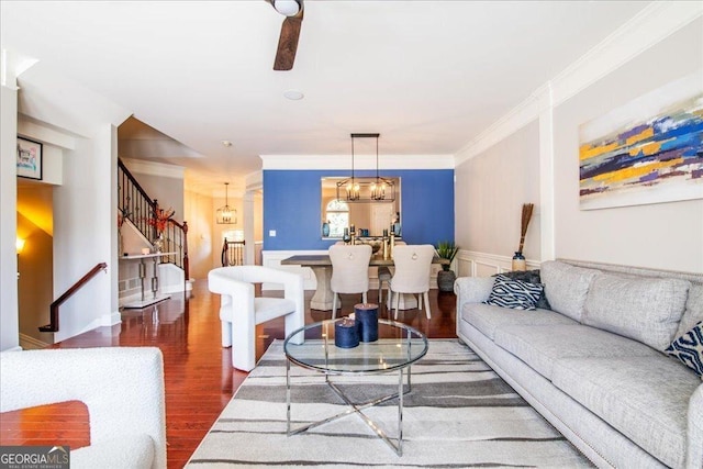 2145 Shoop Ct SE Unit 3, Smyrna, GA 30080 - living area with stairs, ornamental molding, wood finished floors, a chandelier, and ceiling fan