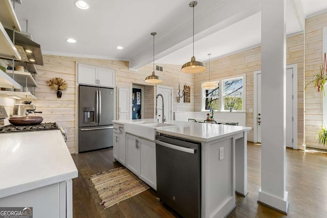 124 Nichols Branch Ln, Clayton, GA 30525 - kitchen featuring stainless steel fridge, dishwashing machine, wood walls, light countertops, and dark wood-style flooring