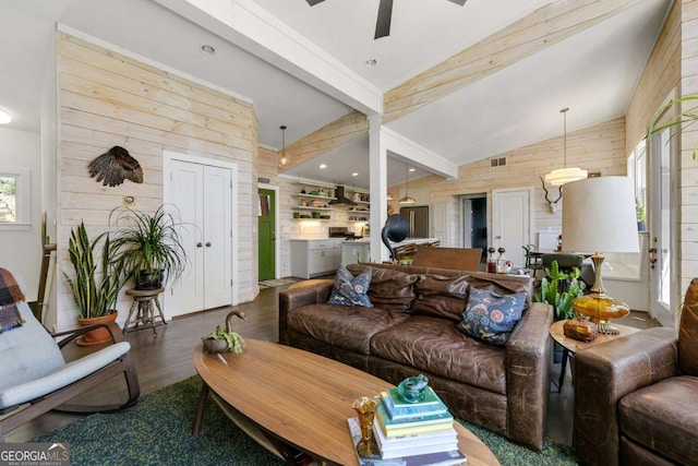 124 Nichols Branch Ln, Clayton, GA 30525 - living room with wood finished floors, ceiling fan, and wood walls