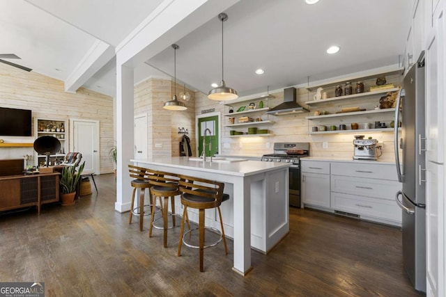 124 Nichols Branch Ln, Clayton, GA 30525 - kitchen with appliances with stainless steel finishes, wall chimney range hood, open shelves, dark wood-style floors, and beamed ceiling