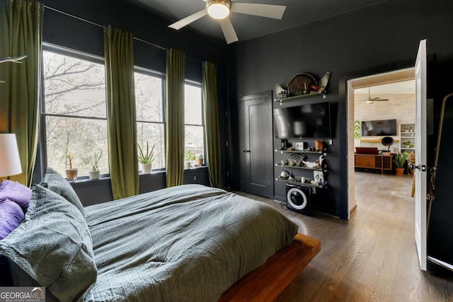124 Nichols Branch Ln, Clayton, GA 30525 - bedroom featuring wood finished floors and ceiling fan