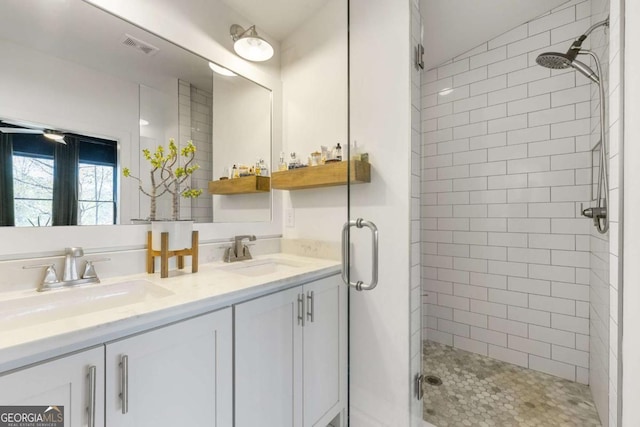124 Nichols Branch Ln, Clayton, GA 30525 - full bathroom featuring a stall shower and double vanity