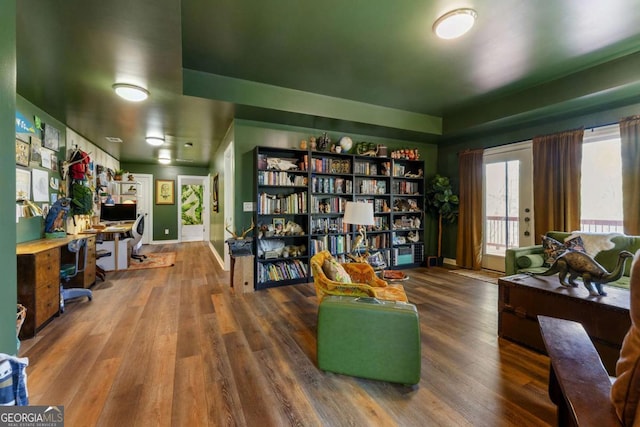 124 Nichols Branch Ln, Clayton, GA 30525 - living area with wood finished floors and a desk