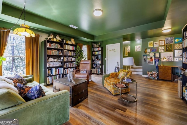 124 Nichols Branch Ln, Clayton, GA 30525 - living room with wood finished floors and a tray ceiling