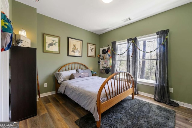 124 Nichols Branch Ln, Clayton, GA 30525 - bedroom with wood finished floors and baseboards
