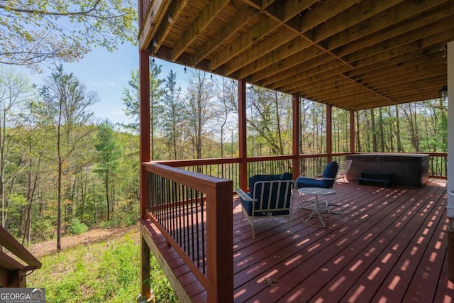 124 Nichols Branch Ln, Clayton, GA 30525 - wooden terrace with a hot tub and a wooded view