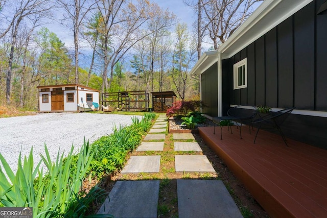 124 Nichols Branch Ln, Clayton, GA 30525 - view of yard featuring a storage unit