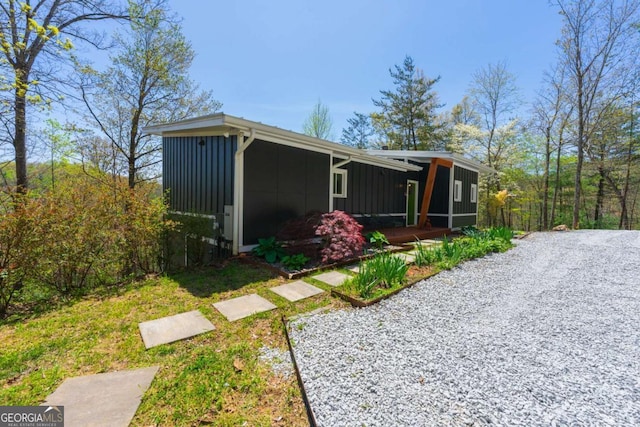 124 Nichols Branch Ln, Clayton, GA 30525 - view of outbuilding featuring covered porch