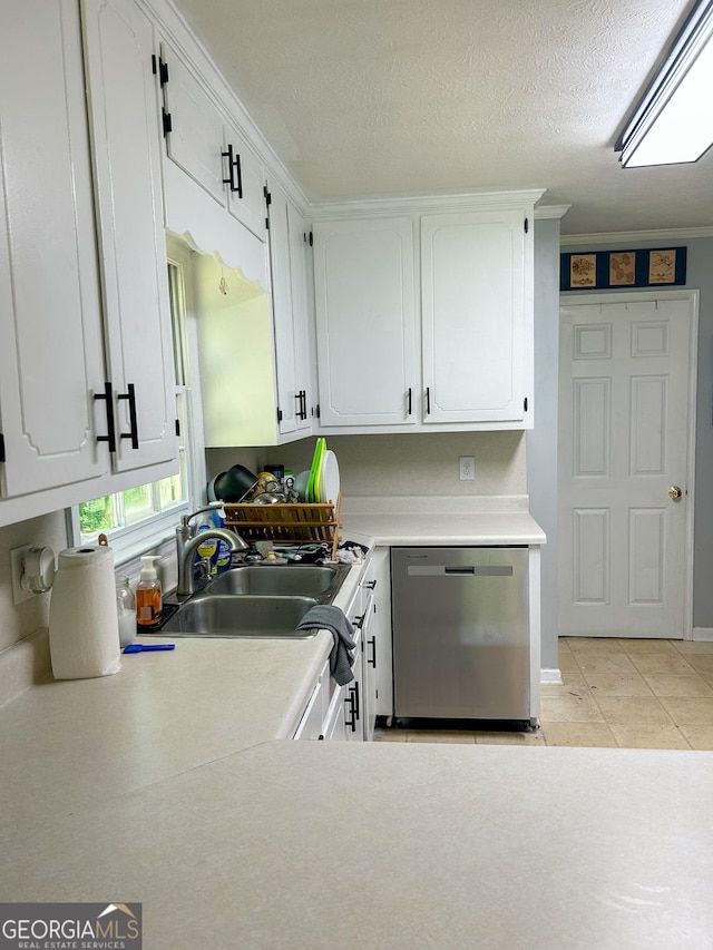 15 Laurelwood Cir, Griffin, GA 30224 - kitchen with dishwasher, a sink, light countertops, white cabinetry, and a textured ceiling