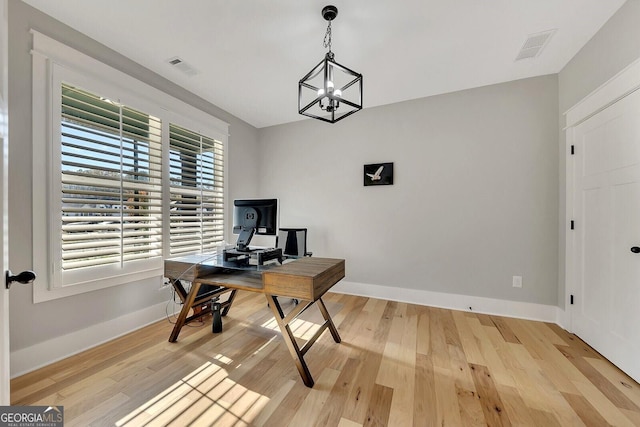 2710 Sandy Irwin Ct SW, Marietta, GA 30064 - office with wood finished floors, visible vents, and baseboards