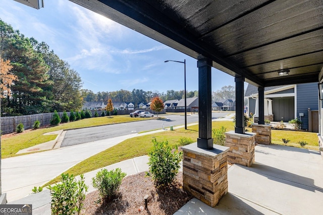 2710 Sandy Irwin Ct SW, Marietta, GA 30064 - view of patio with a porch and a residential view