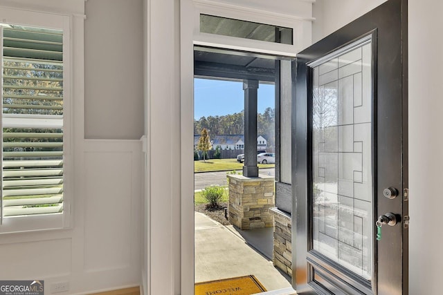 2710 Sandy Irwin Ct SW, Marietta, GA 30064 - entryway featuring wainscoting and a decorative wall