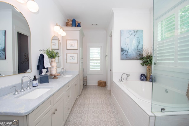 bathroom with double vanity, a bath, and a sink