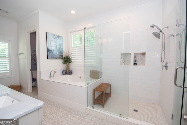 full bathroom with a shower stall, visible vents, a bath, vanity, and tile patterned flooring