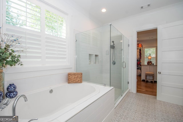 full bathroom with visible vents, a stall shower, a garden tub, and recessed lighting